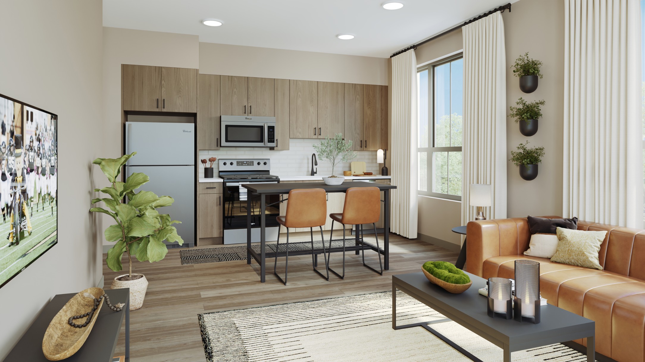 Model kitchen and living room at Creekside at the Grounds
