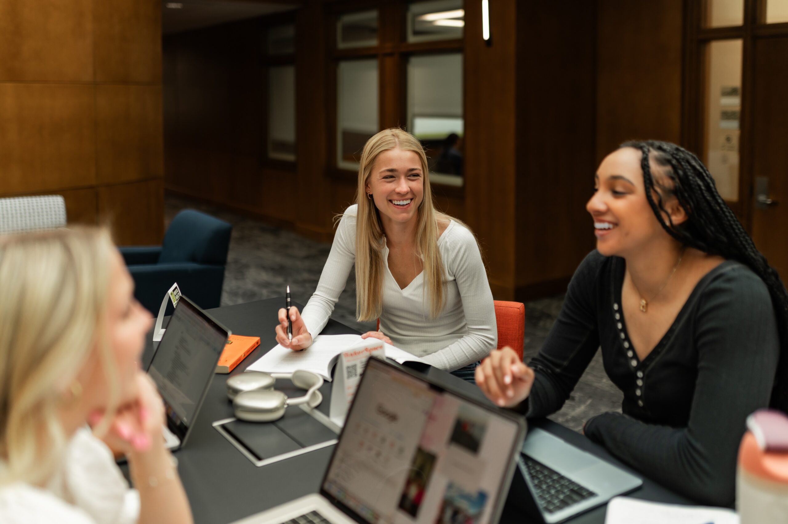 college students studying together indoors scaled