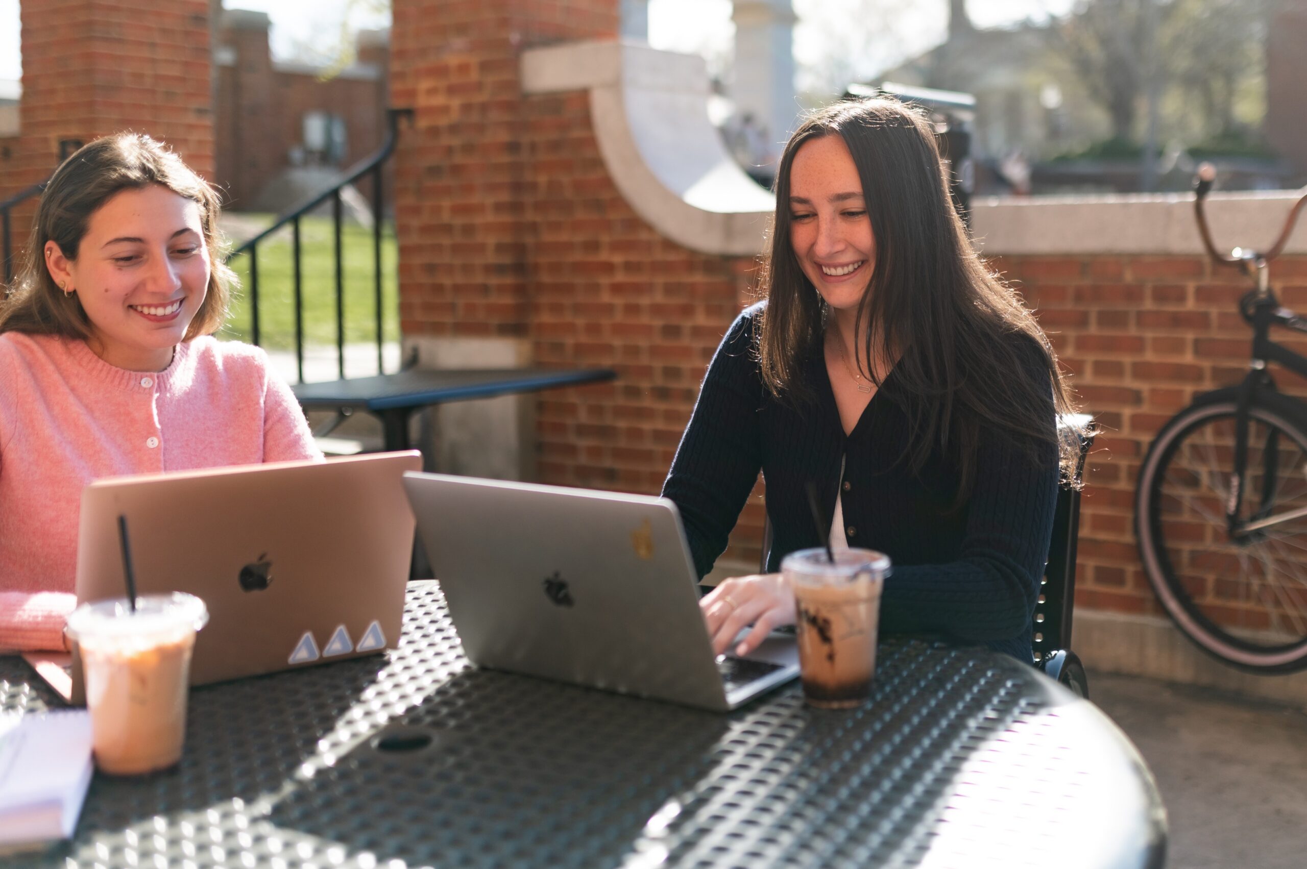 university students working at outdoor terrace scaled