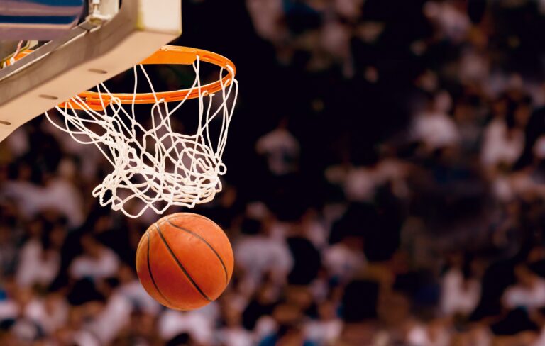 basketball ball falling through hoop